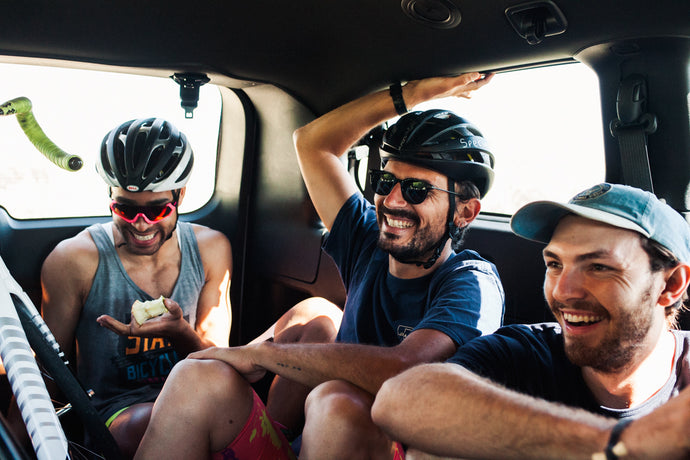 Three riders smiling