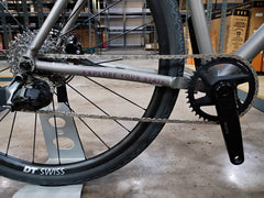 #1588NS – Titanium All-Road | Purple Logo / Drop Bars / Rival eTap / 700x38c (Size Large, Used-Very Good Condition)